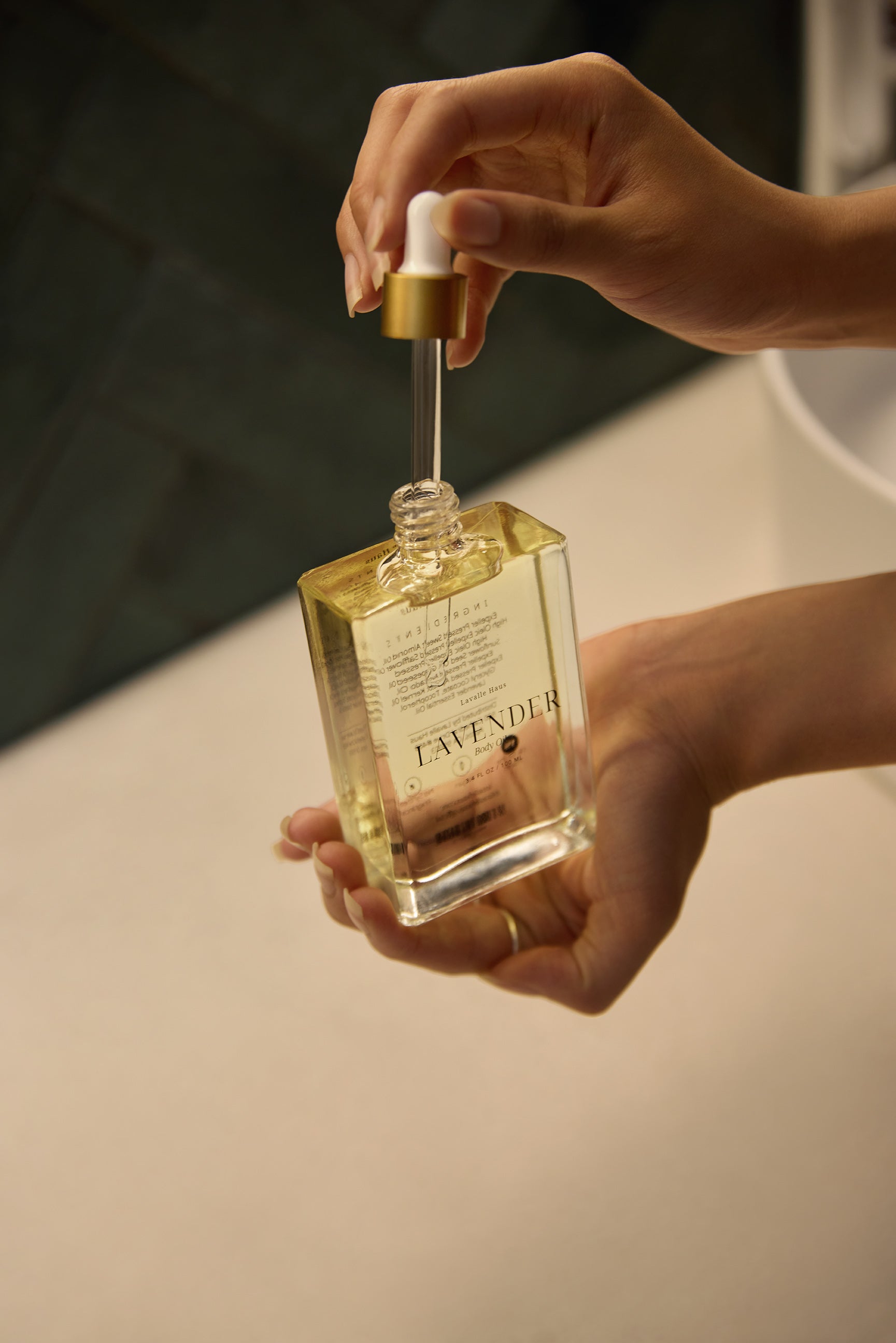Lavender Body Oil held in hands